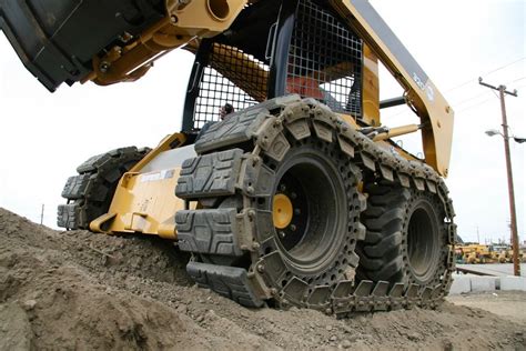 skid steer tracks vs tires|mounted skid steer tires.